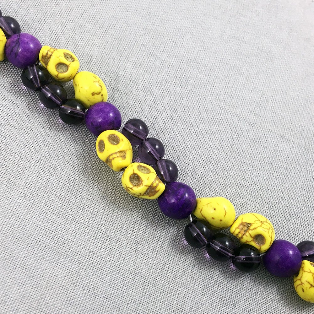 Bracelet with Yellow Skulls and Purple Beads