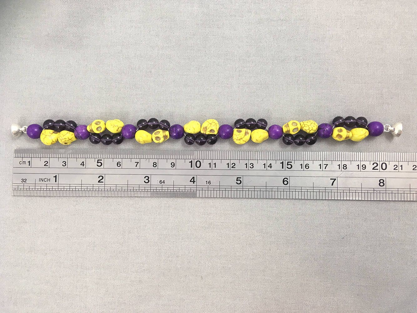 Bracelet with Yellow Skulls and Purple Beads