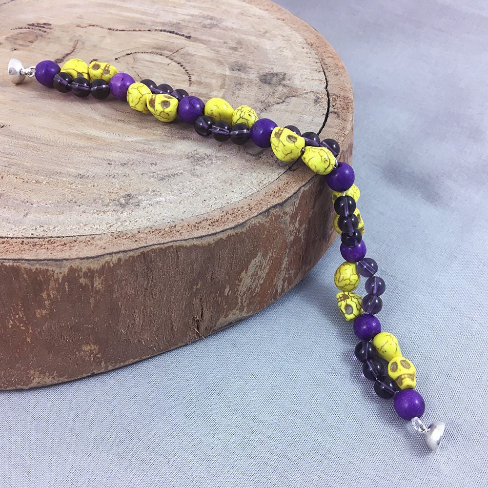 Bracelet with Yellow Skulls and Purple Beads