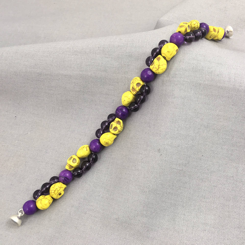 Bracelet with Yellow Skulls and Purple Beads