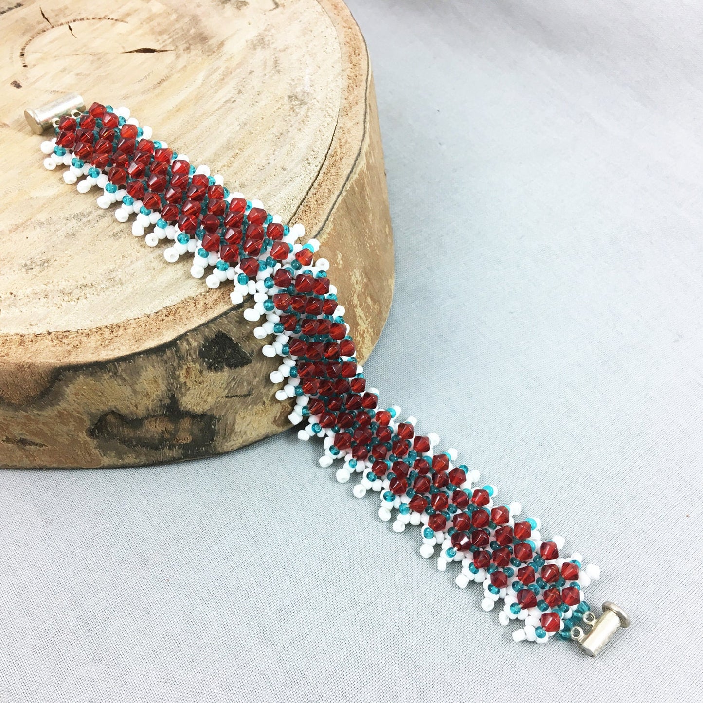 White and Turquoise Beaded Bracelet with Red Crystals