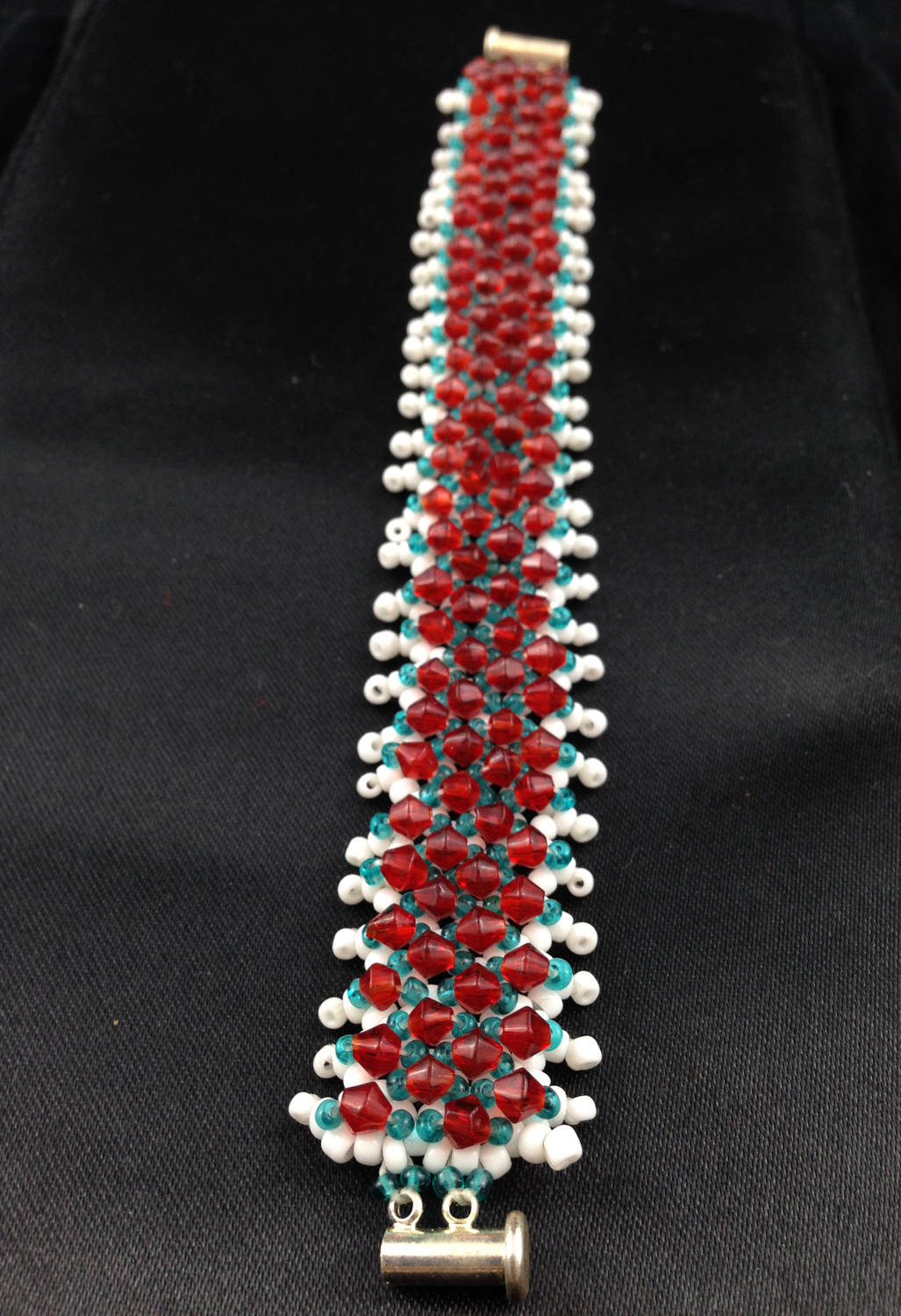 White and Turquoise Beaded Bracelet with Red Crystals