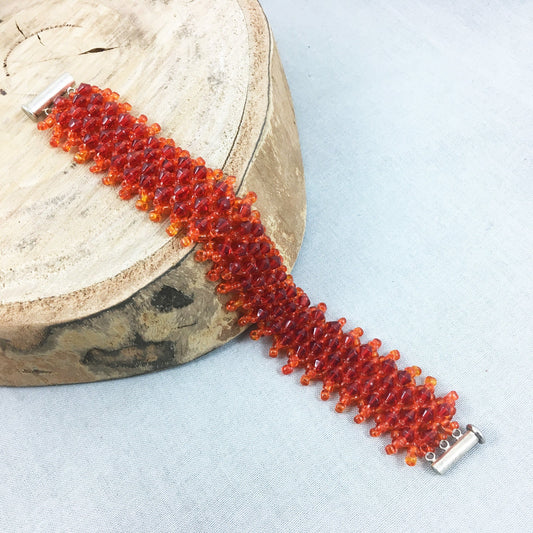 Orange Beaded Bracelet with Red Crystals