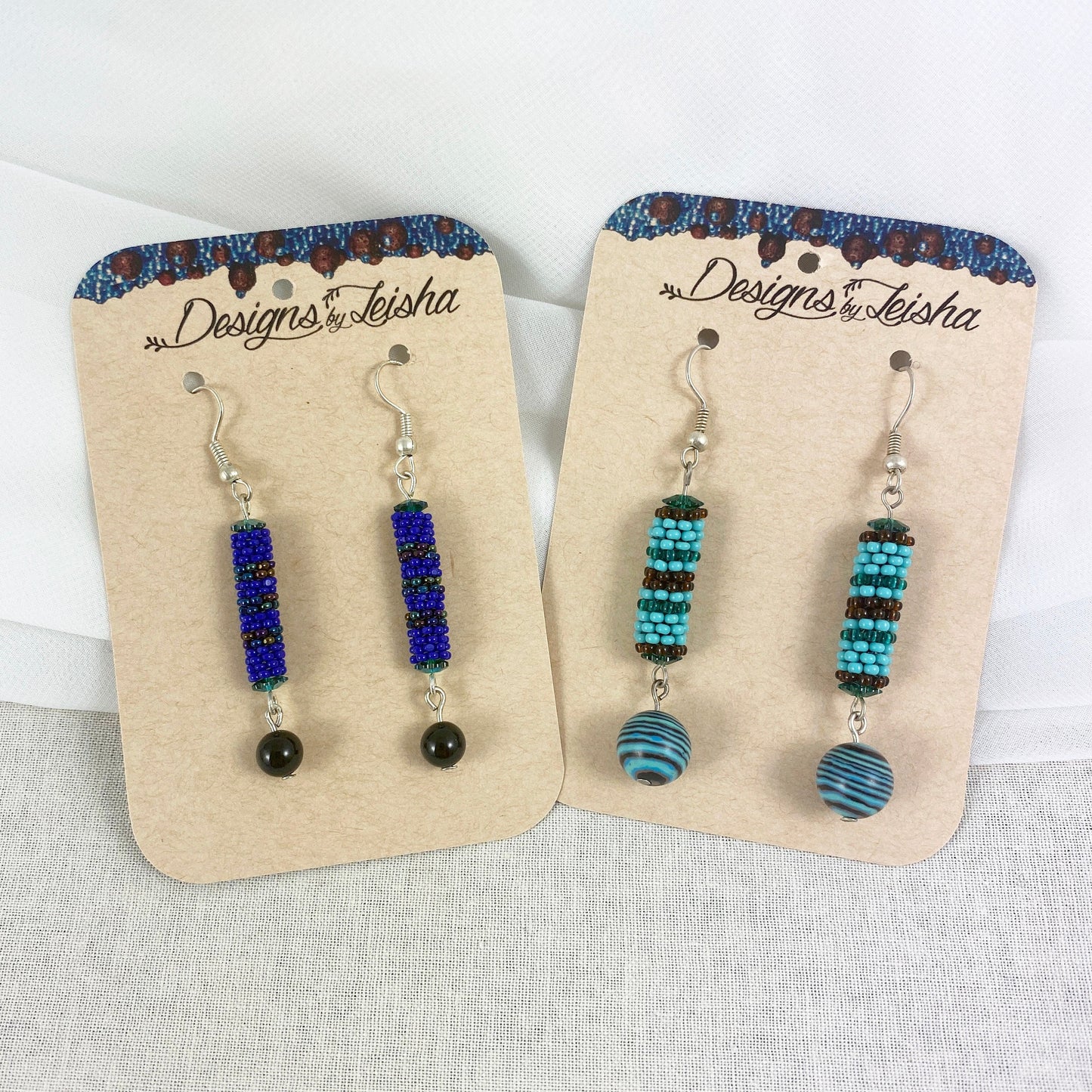 Beaded horizontal striped dangle earrings - blue metallic, turquoise, brown